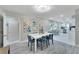 Dining room features modern decor, stylish light fixture, and seating for six at 4753 48Th N Ave, St Petersburg, FL 33714