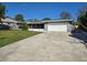 Charming single-story home with a well-maintained front yard and a two-car garage at 4753 48Th N Ave, St Petersburg, FL 33714