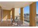 Private balcony featuring seating with views of the water and neighborhood at 5353 Gulf Blvd # B103, St Pete Beach, FL 33706
