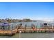 Waterfront home featuring a private boat dock and stunning views of the bay and surrounding neighborhood at 5353 Gulf Blvd # B103, St Pete Beach, FL 33706