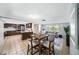 Spacious kitchen and living space featuring modern appliances and comfortable seating, perfect for entertaining at 5910 River Rd, New Port Richey, FL 34652