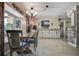 Inviting dining area with stylish chandelier and comfortable seating at 5931 33 N Ave, St Petersburg, FL 33710