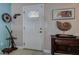 Inviting front door with glass insert and interior decor at 5931 33 N Ave, St Petersburg, FL 33710