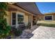Charming front porch with brick pavers and lush landscaping at 5931 33 N Ave, St Petersburg, FL 33710