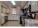 Well-equipped kitchen with updated appliances and plenty of cabinet space at 5931 33 N Ave, St Petersburg, FL 33710