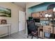 Home office setup with built-in storage and shelving at 5931 33 N Ave, St Petersburg, FL 33710