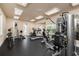 Well-equipped gym with treadmills, weights, and other exercise machines at 672 Old Windsor Way, Spring Hill, FL 34609