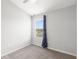 Cozy bedroom featuring plush carpet, a ceiling fan and a window with natural light at 6872 40Th N Ln, Pinellas Park, FL 33781