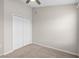 Clean bedroom with carpet, a ceiling fan and closet provide essential comfort and storage at 6872 40Th N Ln, Pinellas Park, FL 33781