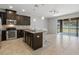 Modern kitchen with stainless steel appliances, granite countertops, and an open layout at 6872 40Th N Ln, Pinellas Park, FL 33781