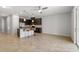 Bright open-concept living space featuring a seamless transition to the kitchen and a clean modern design at 6872 40Th N Ln, Pinellas Park, FL 33781