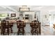 Stylish kitchen with a marble countertop island and modern pendant lighting fixtures at 6907 W Creek Dr, Tampa, FL 33615