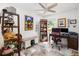 Home office with desk, shelving, decorative furnishings, and ample natural light at 6907 W Creek Dr, Tampa, FL 33615