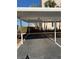 Assigned parking spot under carport labeled 306 at 7645 Sun Island S Dr # 306, South Pasadena, FL 33707