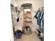 Organized walk-in closet with shelving and hanging space for clothes and accessories at 7645 Sun Island S Dr # 306, South Pasadena, FL 33707
