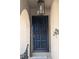Close up featuring the decorative security door and light fixture above the door at 8004 25Th W Ave, Bradenton, FL 34209