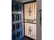 Close up of the entrance door with secure decorative security door at 8004 25Th W Ave, Bradenton, FL 34209