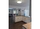 Open concept kitchen with a center island and views to the living spaces beyond at 8004 25Th W Ave, Bradenton, FL 34209