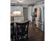 Well-lit kitchen with stainless steel appliances and granite countertops for meal preparation at 8004 25Th W Ave, Bradenton, FL 34209