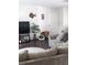 Comfortable living room featuring hardwood floors and neutral colored walls at 8004 25Th W Ave, Bradenton, FL 34209
