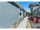 Beautiful home exterior with a well-maintained walkway, landscaping, and inviting curb appeal at 8116 Sanguinelli Rd, Land O Lakes, FL 34637