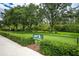Enjoy this outdoor community pet park with benches and lush landscaping at 8116 Sanguinelli Rd, Land O Lakes, FL 34637