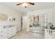 A cozy Bedroom is reflected in a mirrored closet, showcasing the room's layout and design at 915 Live Oak Ne Ter, St Petersburg, FL 33703