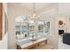 Bright dining area with large windows overlooking the pool and backyard at 915 Live Oak Ne Ter, St Petersburg, FL 33703