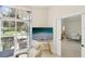 Bright office space with a large window and views of the front yard and neighborhood at 915 Live Oak Ne Ter, St Petersburg, FL 33703