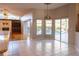 Open dining area with tile floors, sliding glass doors to the pool, and a bar counter at 9159 Highland Ridge Way, Tampa, FL 33647