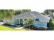 Charming single-story home with lush landscaping and sidewalk at 9159 Highland Ridge Way, Tampa, FL 33647