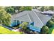 Beautiful single-story home with lush landscaping and sidewalk at 9159 Highland Ridge Way, Tampa, FL 33647