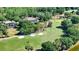 Beautiful golf course with sand traps, mature trees and houses at 9159 Highland Ridge Way, Tampa, FL 33647