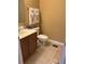 Bathroom featuring tile floors, vanity and a toilet at 9508 Ashburn Creek Ln, Tampa, FL 33610