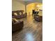 Cozy living room and dining room with beautiful floors at 9508 Ashburn Creek Ln, Tampa, FL 33610
