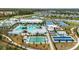 Desirable community features pool, tennis, and shuffleboard, plus common areas and lush landscaping at 9684 Minnow Ray Dr, Land O Lakes, FL 34638