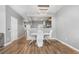 Bright dining room with modern table, chairs, and lighting fixture at 10212 Westpark Preserve Blvd, Tampa, FL 33625