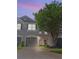 Charming townhome with gray exterior and well-maintained landscaping at 10212 Westpark Preserve Blvd, Tampa, FL 33625