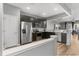 Modern kitchen featuring stainless steel appliances and dark cabinetry at 10212 Westpark Preserve Blvd, Tampa, FL 33625