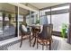 Enclosed patio features seating with sliding glass door access to the interior at 10212 Westpark Preserve Blvd, Tampa, FL 33625