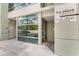Modern entrance to The Place at Channelside featuring sleek glass doors and signage at 111 N 12Th St # 1502, Tampa, FL 33602