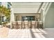 Outdoor kitchen and bar area featuring seating and a grill for condo residents at 111 N 12Th St # 1502, Tampa, FL 33602
