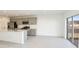 Island sink and cabinets and back patio doors at 12466 Gust Ct, Hudson, FL 34669