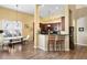 Eat-in kitchen with a sunny breakfast nook and adjacent bar seating area at 13312 Tiger Lilly Ln, Tampa, FL 33625