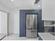 Modern kitchen showcasing stainless steel appliances and beautiful cabinetry at 14926 Feather Cove Rd, Clearwater, FL 33762