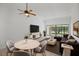Bright living room with a ceiling fan, and sliding glass doors at 14926 Feather Cove Rd, Clearwater, FL 33762
