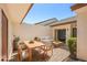 Stylish outdoor patio with dining and seating areas perfect for entertaining at 14926 Feather Cove Rd, Clearwater, FL 33762