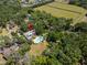 Aerial view of the estate property with lush trees and a marked location at 1603 Cottagewood Dr, Brandon, FL 33510