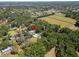 Overhead view of a neighborhood and property location surrounded by beautiful trees at 1603 Cottagewood Dr, Brandon, FL 33510