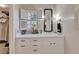Bright bathroom vanity with white cabinets and natural light at 1603 Cottagewood Dr, Brandon, FL 33510